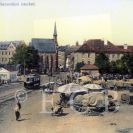 Nemocnice: Senovážné náměstí se starou nemocnicí naproti kostelu Svaté Rodiny, pohlednice z počátku 20. století; SOkA.
